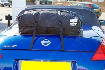 rear view of a blue nissan 370z with a boot-bag luggage rack fitted