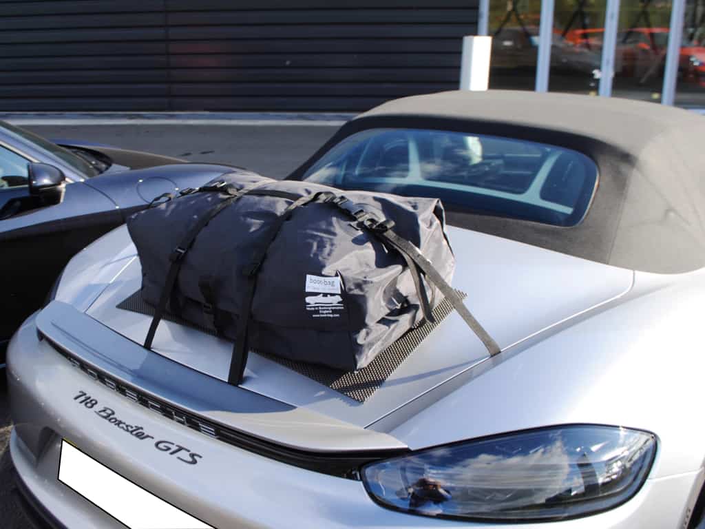 porsche boxster 718 gts with a boot-bag original luggage trunk rack fitted at porsche silverstone uk