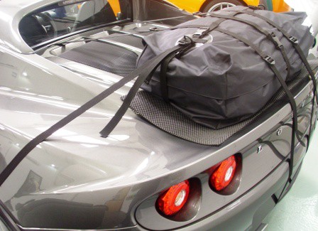 side view of a grey lotus elise s3 with a boot-bag original luggage rack fitted