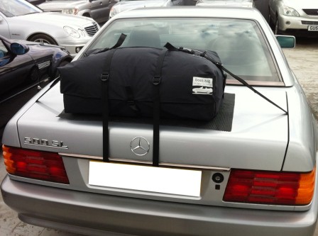 silver mercedes benz 500sl R129 with a boot-bag luggage rack fitted