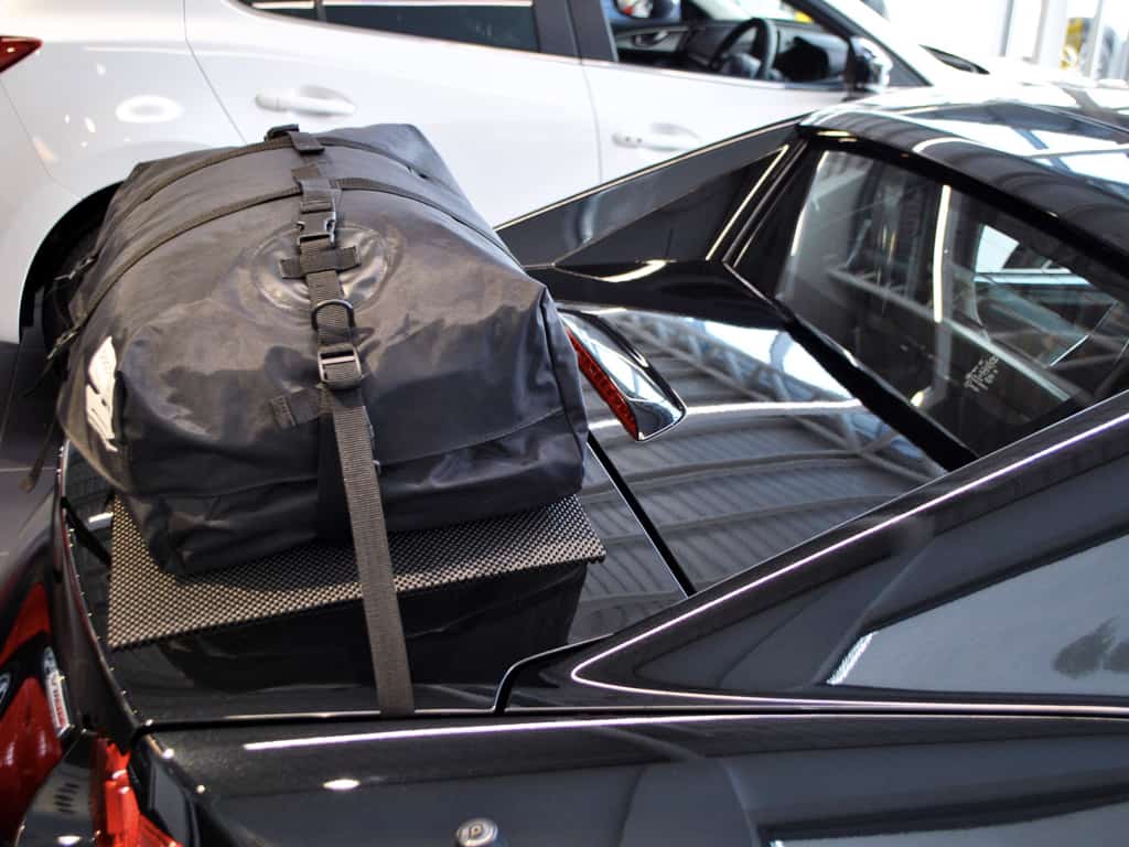 side view of a boot-bag luggage rack fitted to a black mx5 rf