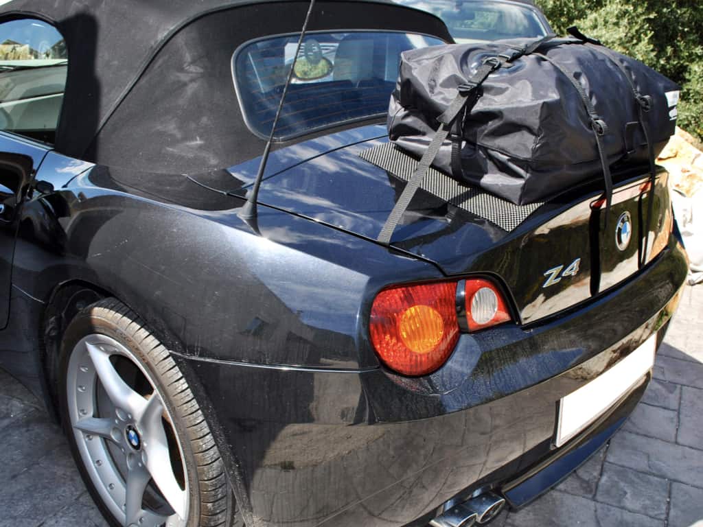 side view of a black bmw z4 e85 with a boot-bag luggage boot rack fitted