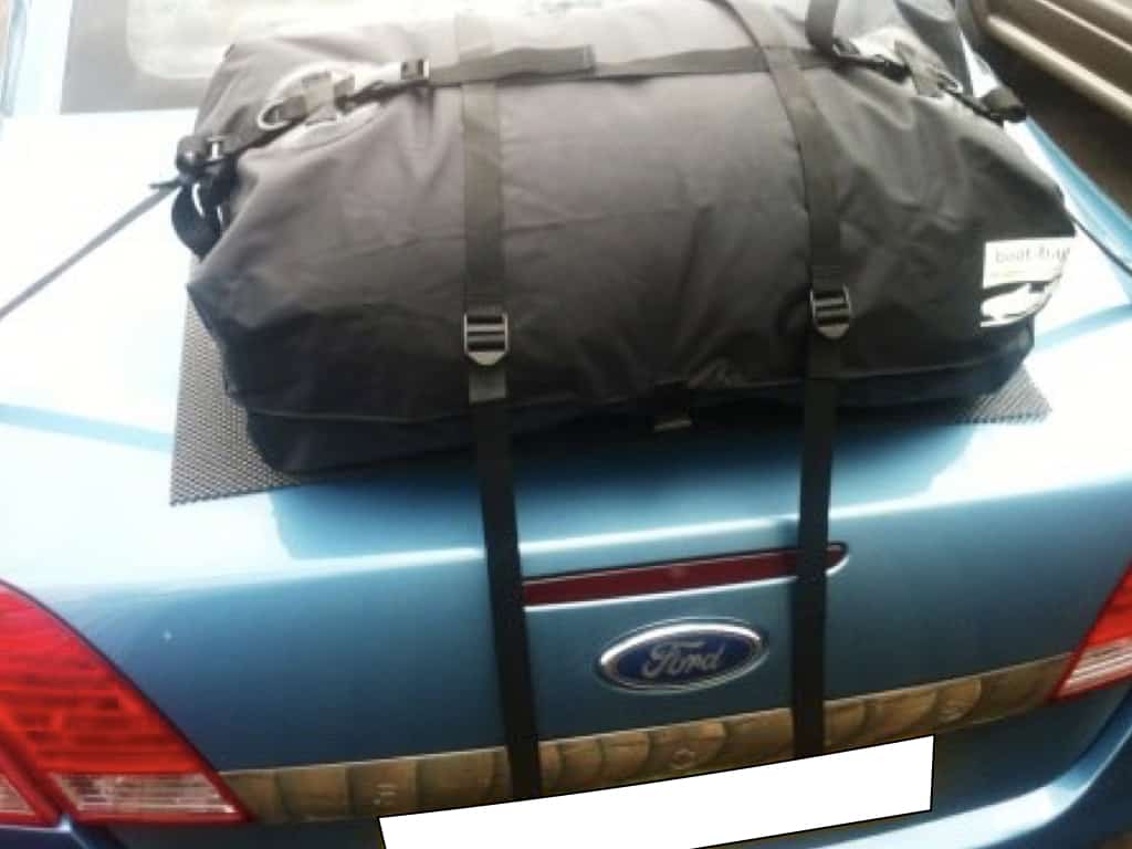 blue ford focus cc with a boot-bag original luggage rack fitted
