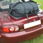 burgandy mazda mx5 mk2 with a boot rack fitted