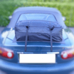 green madza mx5 mk1 with a boot-bag luggage rack fitted