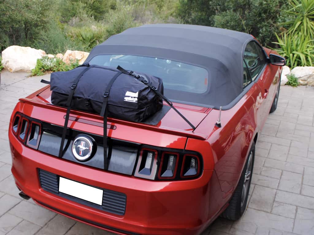 aerial view of a ford mustang cabriolet with a luggage rack fitted