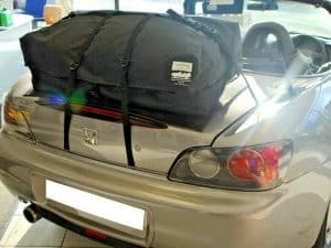 silver honda s2000 in a showroom with a boot-bag vacation boot rack fitted