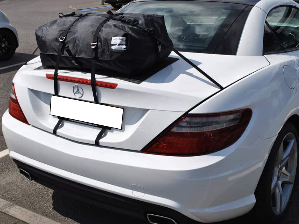 white slc 250d with a boot-bag original luggage rack fitted to the trunk/boot