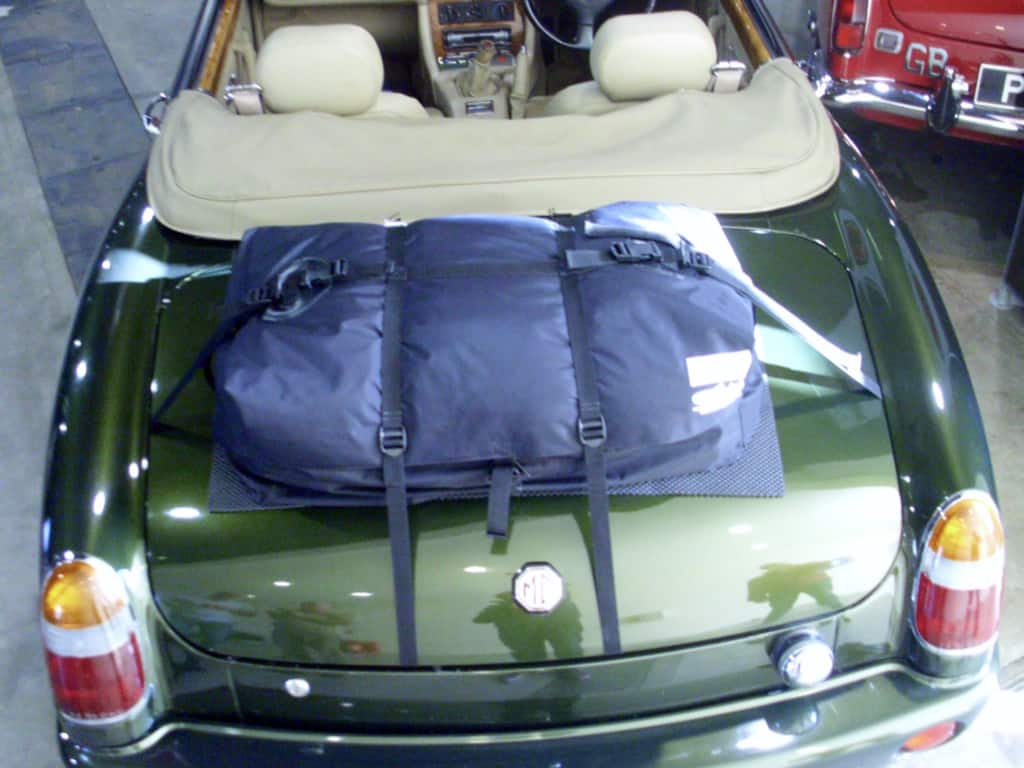 green MG RV8 with a boot-bag original luggage rack fitted photographed from above