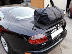 black jaguar xk8 coupe with. boot-bag luggage roof rack box fitted