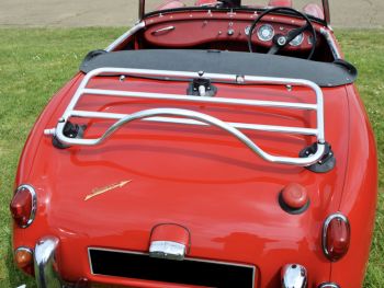red austin healey sprite with a revo-rack luggage rack fitted