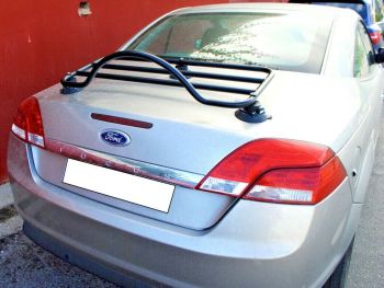 silver ford focus convertible cabriolet with a black luggage rack fitted