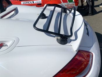 white porsche boxster spyder with a revo-rack black luggage rack fitted photographed close at the rear 
