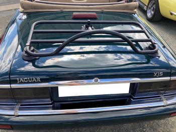 Blue jaguar xjs with a luggage rack fitted
