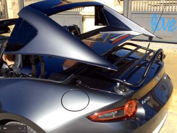 mazda mx5 rf luggage rack fitted to grey RF roof being lowered with the rack in place