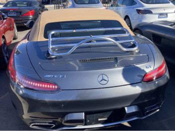 Grey mercedes AMG GT Convertible GTC with a Revo-Rack PA luggage Rack fitted photographed from the rear the car has a beige hood