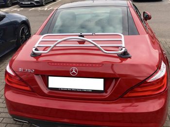 red mercedes benz sl r231 350 with a revo-rack pa luggage rack fitted photographed close at the rear 