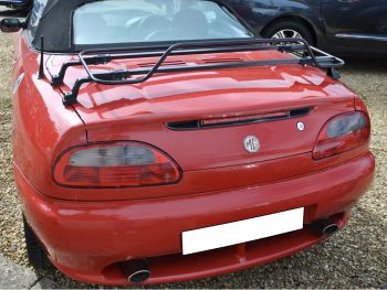 red mgf in a gravel car park with a black boot rack fitted